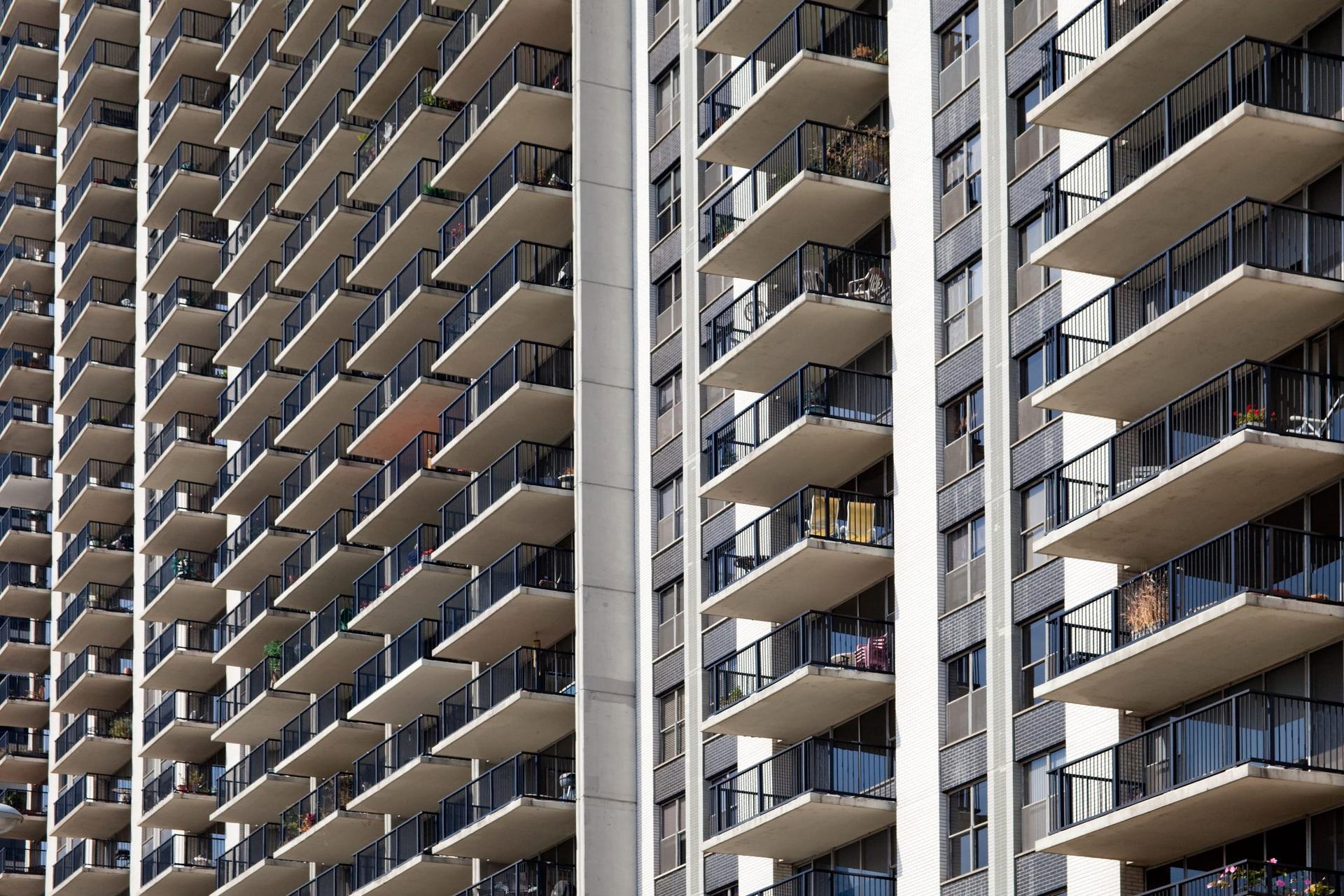 Rows of balconies on two high-rise apartment towers